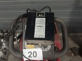 an image of a small engine in a garage