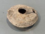 a small piece of stone that is sitting on a table