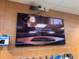 a large flat screen tv hanging on the wall