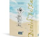 a book with a drawing of a man standing on a beach