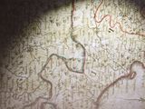 a picture of a map on the wall of a building