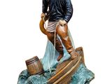 figurine of a fisherman on a boat with a net