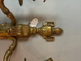pair of antique brass wall sconces with ornate handles