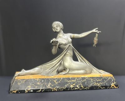 an image of a statue of a woman sitting on a marble base