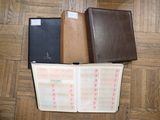 three different types of leather folders on the floor