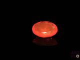 an image of a candle that is glowing in the dark