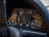 a close up of a car dashboard with various gauges