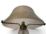 an image of a lamp with a glass shade on it