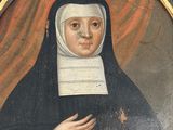 portrait of a woman with a dog in a black frame