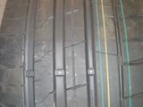 a close up of a tire on a shelf in a room