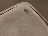 a close up of a knife on a table