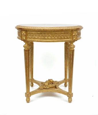 GUERIDON En bois doré et sculpté doré, le plateau circulaiur…