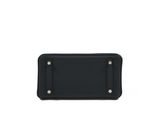 a black leather wallet with a metal clasp on the front