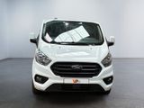 ford transit van in a showroom with white walls
