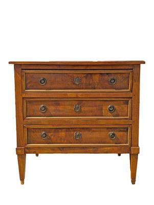 an image of a wooden chest of drawers on a white background