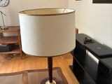 a lamp that is sitting on a table in a living room