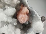 a close up of a rock with a small piece of rock inside of it