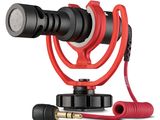 a red microphone with a red cord attached to it