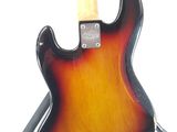 an electric guitar with a brown body and a black neck