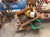 a box full of chains and other items on a pallet