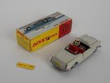 an image of a toy car and a box on a white surface