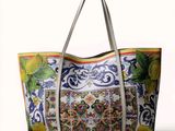 the large tote bag is decorated with lemons and flowers