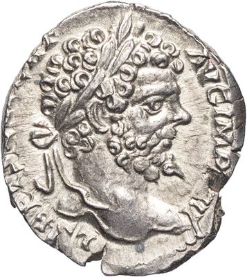une pièce d'argent représentant la tête d'un homme coiffé d'une couronne