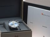 a box with a watch inside of it and a box with a watch inside of it