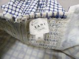 a close up of a dress with a label on it