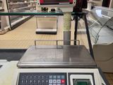 a scale that is sitting on a counter in a store