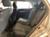 the back seats of a car are empty and the passenger seat is empty