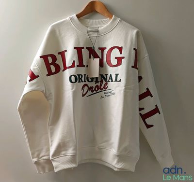 a white sweatshirt with the words being original is hanging on a hanger