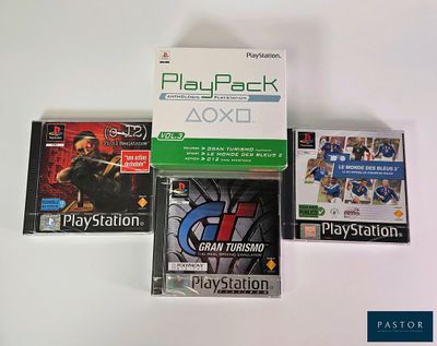 Plusieurs jeux vidéo sont posés sur une surface blanche