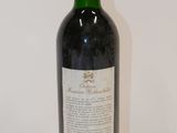 a bottle of wine that is sitting on a table