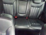 the back seats of a car are black in color
