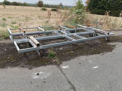 a metal frame that has been placed on the side of the road