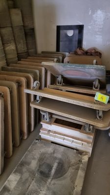 many pieces of luggage sitting on the floor in a room