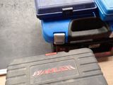 two cases that are sitting on a table