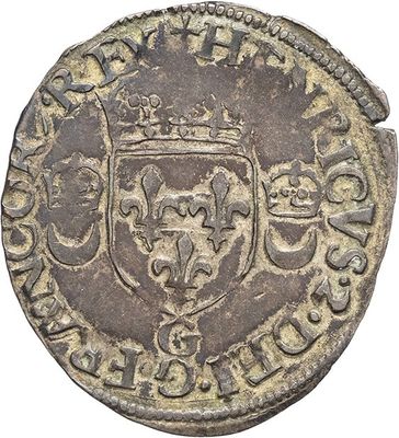 an old coin with a crown on top of it