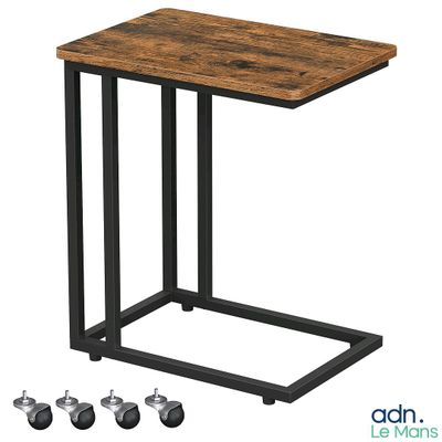 La table d'appoint est en bois et en métal et est équipée de roulettes.
