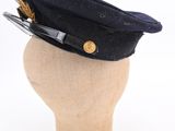 hat on a mannequin head on a white background