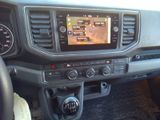 a car dashboard with a digital display in the center