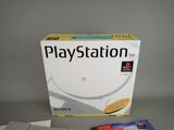 a close up of a box of video games on a table
