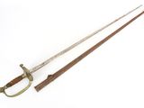 an old sword with a wooden handle on a white surface
