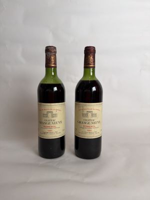 two bottles of wine sitting next to each other on a white surface