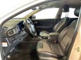the interior of a white car with black leather seats and a steering wheel