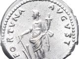 a silver coin with a statue of a woman holding a sword