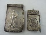 silver plated locke with a picture of a woman and a castle