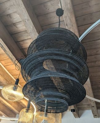 a light that is hanging from the ceiling in the room