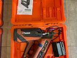 two tools in the orange case on the floor
